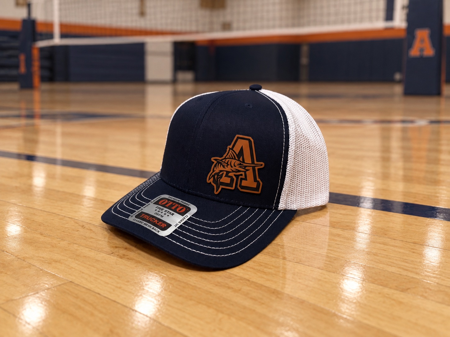 Navy and white mesh Arnold High School Volleyball hat.