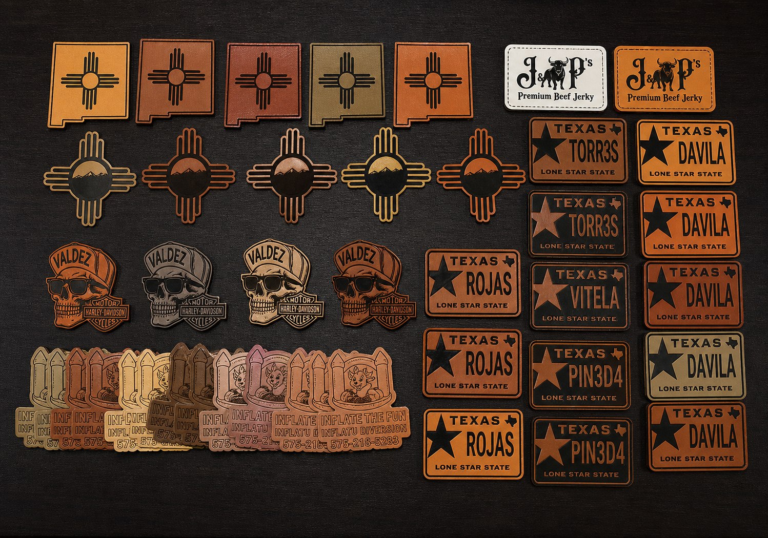 Display board with custom engraved leather patches in different colors and shapes.