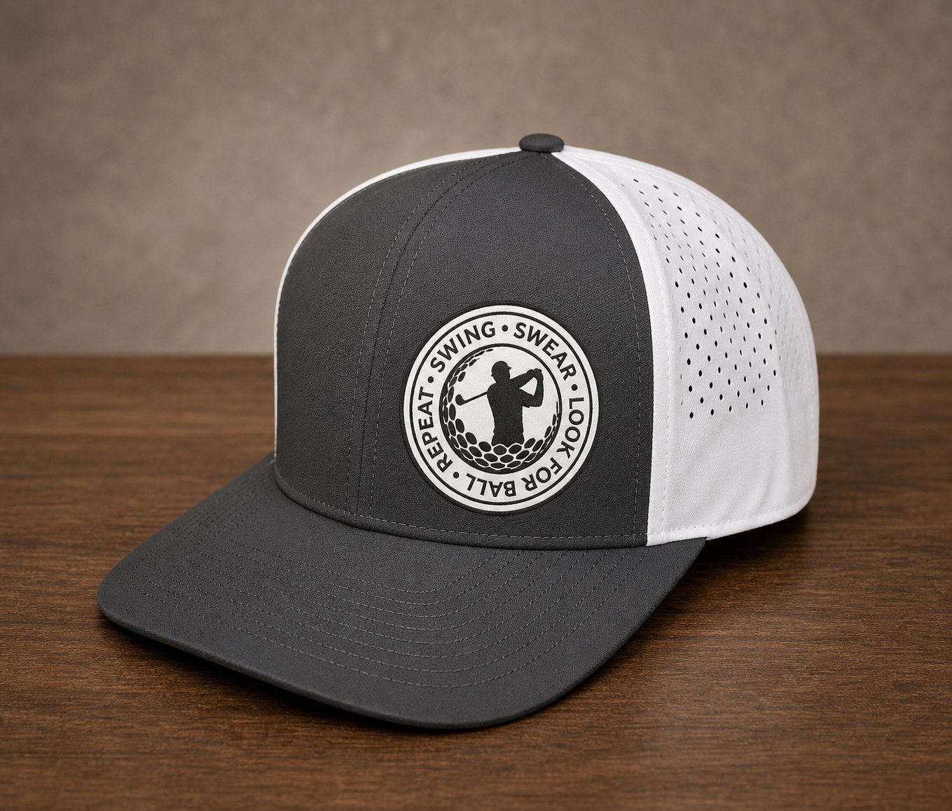 Gray and white hat with a circular golf patch.