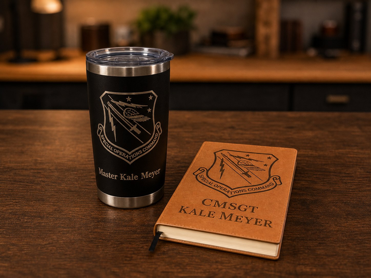 Engraved black tumbler and tan notebook with Special Operations Command artwork.